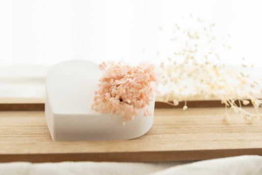 A plaster heart scented with preserved flowers.